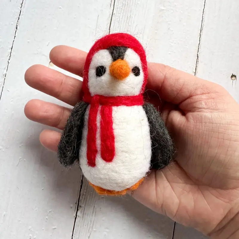 Red-Hat-Wearing Felt Penguin Figurine 1